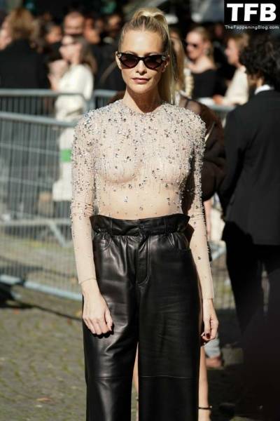 Poppy Delevingne Poses in a See-Through Top at Miu Miu Womenswear Show on chickinfo.com