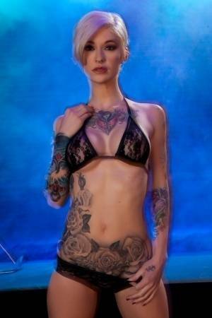 Hot tattooed Kleio Valentien sheds black lace panties to squat & spread legs on chickinfo.com