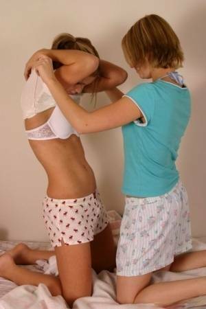 Young amateur Karen & Amy enjoy undressing each other & kissing in underwear on chickinfo.com