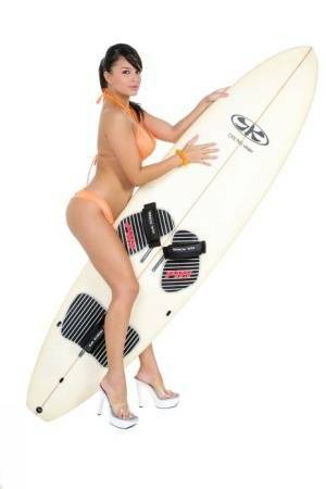 Sexy surfer girl Sarah peels off her bikini to model naked on her board on chickinfo.com