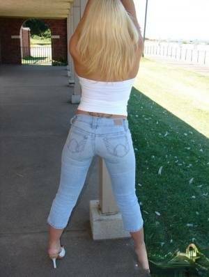 Blonde amateur Karen exposes her lace thong while outdoors in faded jeans on chickinfo.com