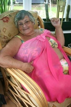 Horny old granny in glasses disrobes to reveal huge saggy tits & big BBW ass on chickinfo.com