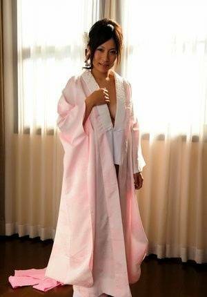 Japanese solo girl slips off her robe to reveal her nice boobs in white socks - Japan on chickinfo.com