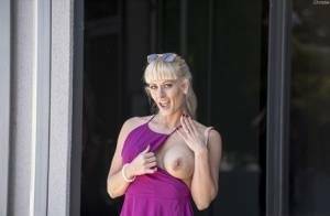 Naughty blonde flashes no panty upskirts and her big tits out in public on chickinfo.com