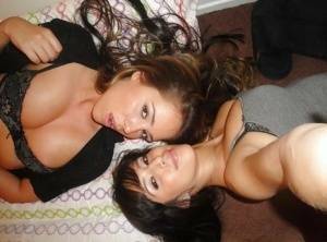 Teen lesbians April Oneil and Ella Milano humping and undressing each other on chickinfo.com