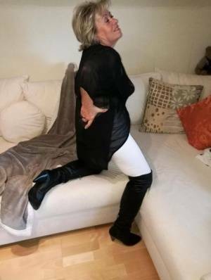 Amateur fatty Caro removes OTK boots and white hose to show her snatch on chickinfo.com