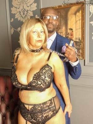 Overweight aged blonde Posh Sophia kneels afore her black owner while collared on chickinfo.com