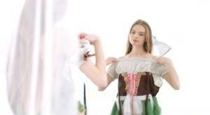 Young beauty Adel Bye dresses in an Oktoberfest outfit to greet her boyfriend on chickinfo.com