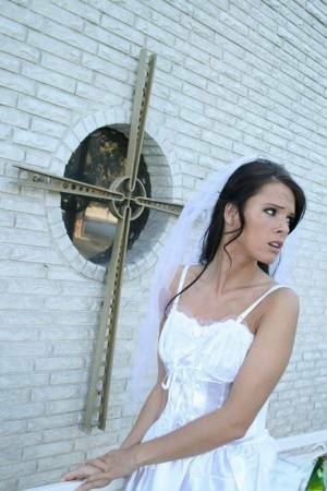 MILF babe in bride's dress Jennifer Dark spreading pussy on chickinfo.com