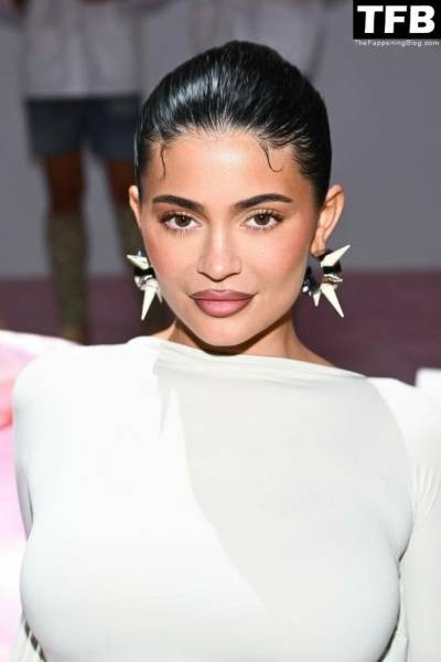 Kylie Jenner Flaunts Her Curves in a White Dress During Paris Fashion Week on chickinfo.com