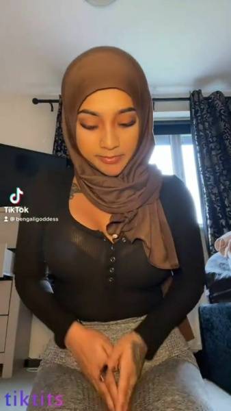 Arab Tik Tok girl 21+ can not hide her sexy tattooed body under the hijab nsfw on chickinfo.com