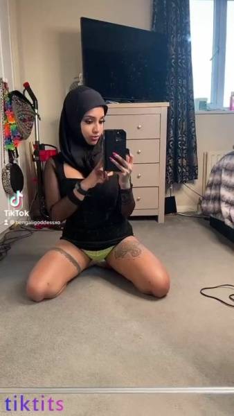 Naughty Muslim woman 18+ gets naked in front of the mirror and jumps on a fat dildo for tiktok porn on chickinfo.com