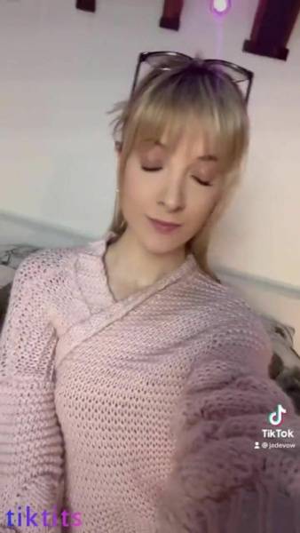 Video TikTok porn from an insatiable blonde with a hard fuck on the bed on chickinfo.com