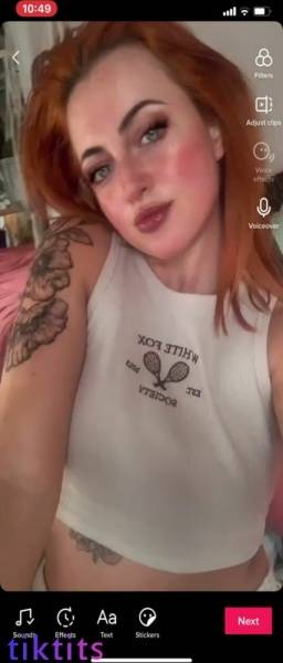 Redheaded bitch with pretty freckles showed her size 34H TikTok tits on chickinfo.com