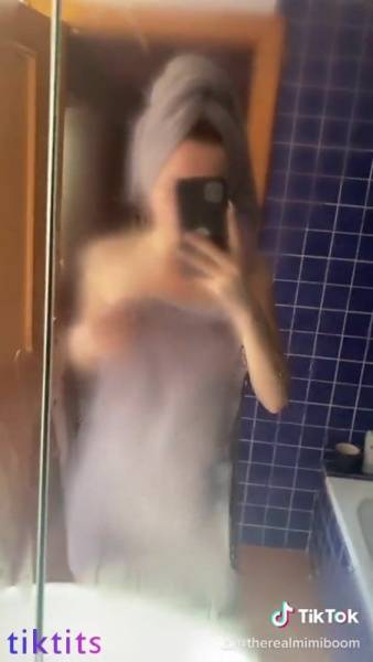 After showering, babe records wet nudes TikTok on chickinfo.com