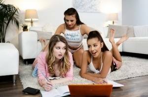 Young girls get busy with a lesbian threesome on a sofa ensemble on chickinfo.com