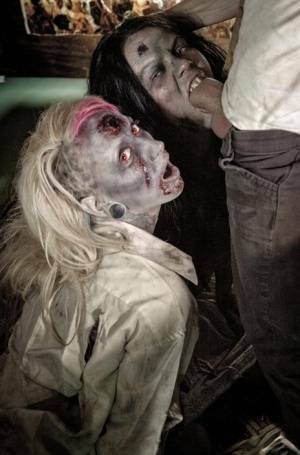 Fetish models Brittany Lynn and Jessie Lee giving head in Zombie threesome on chickinfo.com