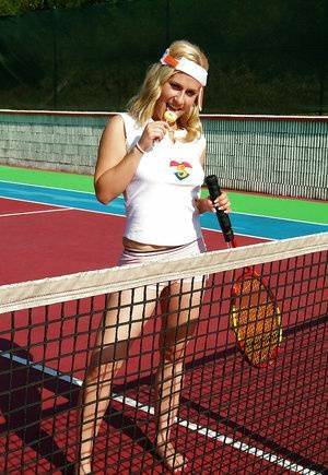 Sporty babe with big tits Angel B toying her cunt on the tennis court on chickinfo.com