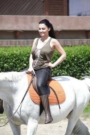 Pornstar Aletta Ocean is riding a horse outdoor in glasses on chickinfo.com