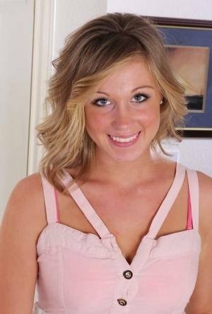 Smiling coed Ashley Jones gets naked for the very first time on chickinfo.com