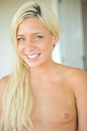 Sweet blonde teen plays with her labia lips before self fisting her pussy on chickinfo.com