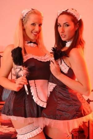 British maids Paige Turnah & Rebecca More have lesbian sex on a bed - Britain on chickinfo.com