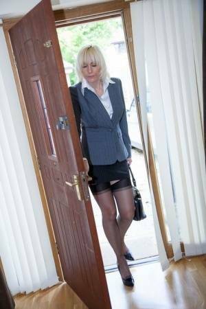 Older MILF Jan Burton strips off business clothes after a hard day at office on chickinfo.com