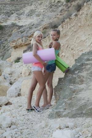 Young hotties Nika N & Milena D head to the hills for lesbian sex on yoga mats on chickinfo.com