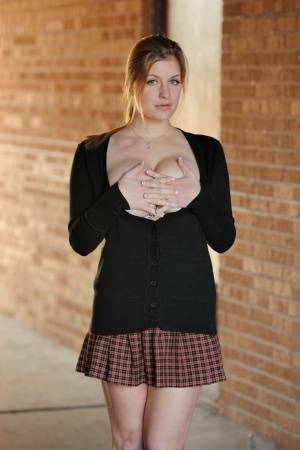 Amateur abbe letting big natural schoolgirl tits loose outdoors in socks on chickinfo.com