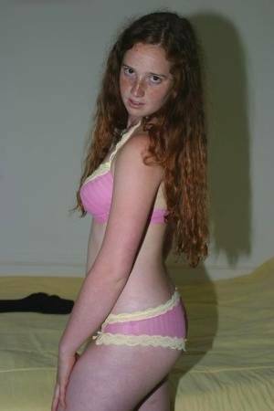Flexible redhead Rachel showcases her natural pussy after lingerie removal on chickinfo.com