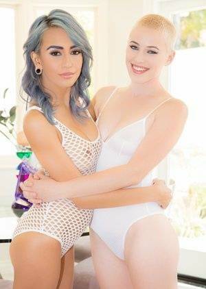 Bisexual female Janice Griffith and her girlfriend give a double blowjob on chickinfo.com