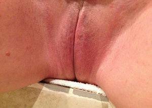 Older amateur Busty Bliss finger spreads her pink vagina after showering on chickinfo.com
