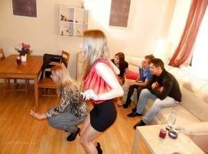 Fully clothed pornstars have some pissing fun at the house party on chickinfo.com