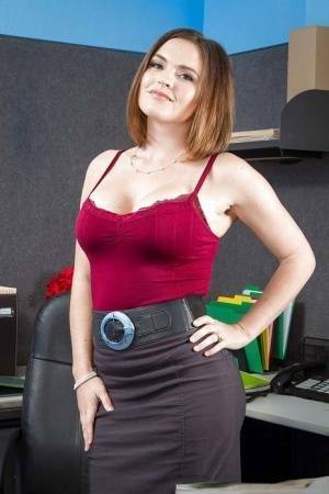 Secretary Krissy Lynn shows her fuckable booty in the office on chickinfo.com
