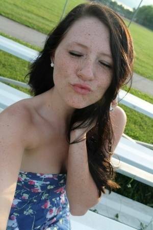 Teen solo girl Freckles 18 exposes her upskirt panties at a ball diamond on chickinfo.com