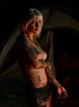 Outdoor posing of a big tits babe in shorts and socks Kleio Valentien on chickinfo.com