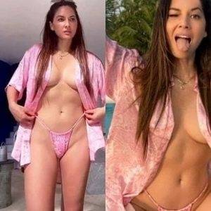 Delphine OLIVIA MUNN FLAUNTS HER CROTCH IN A TINY BIKINI on chickinfo.com