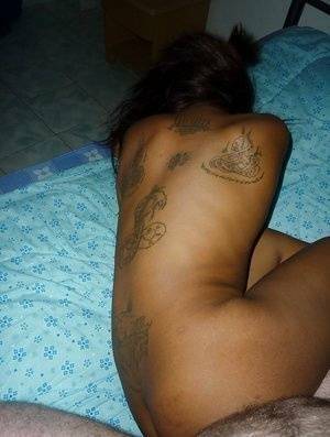 Tattooed Thai girl Nit getting banged bareback on bed by sex tourist - Thailand on chickinfo.com