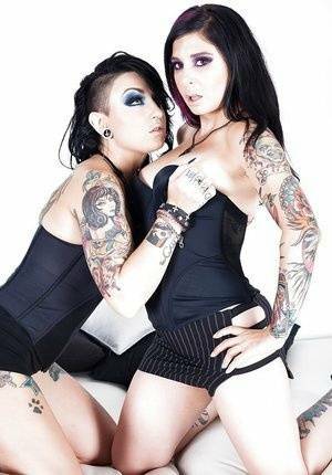 Goth models play with their tatted tight bodies and pussies on chickinfo.com