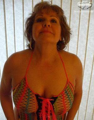 Mature woman Busty Bliss wears see thru attire during POV action on chickinfo.com