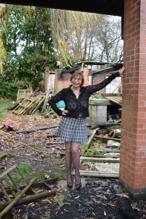 Amateur chick Barby Slut strips to her heels on a demolition site on chickinfo.com