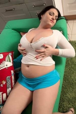 Huge titted hot fatty Juliana Simms wets her white t-shirt for a nipple view on chickinfo.com