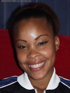 Black amateur Candice flashes a nice smile before baring her great body on chickinfo.com