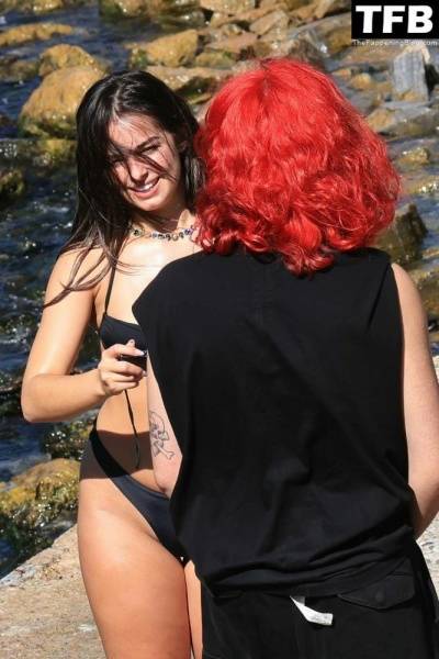 Addison Rae Displays Her Curves in a Black Bikini on Holiday with Omer Fedi on Lake Como on chickinfo.com
