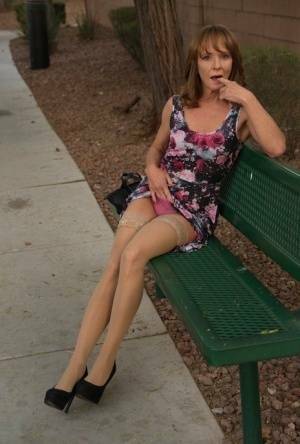 Aged lady flashes her tits and twat on a public bench before disrobing at home on chickinfo.com