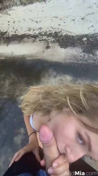 Mia Melano gives blowjob on a beach on chickinfo.com