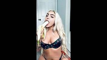 Emily Rinaudo striping teasing and sucking off banana in a black lingerie onlyfans porn videos on chickinfo.com