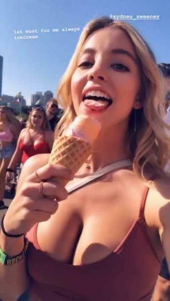 Sydney Sweeney Being Tease by Showing her Licking Skills. She's Drop Dead Gorgeous, her Incredible Rack is Just Unavoidable. on chickinfo.com