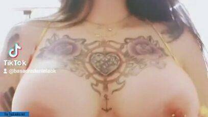 Topless sex model dances another TikTok trend with fake boobs on chickinfo.com