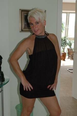 Blonde mature Claudia stipping out of a black dressAmateur,Mature,Stripping on chickinfo.com